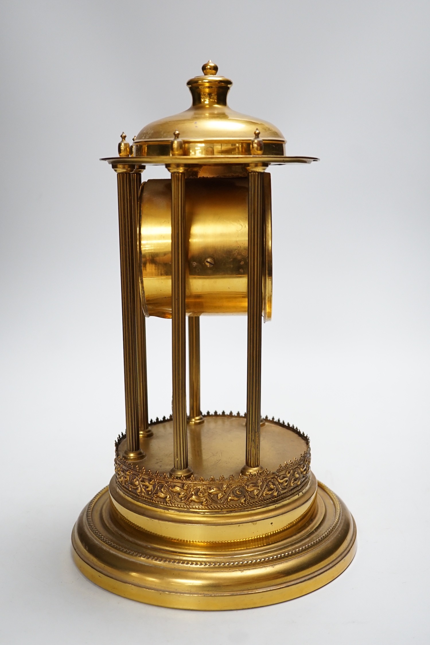 An early 20th century gilt brass pedestal mantel clock, 36cm